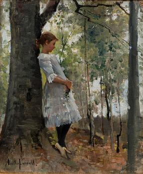 AMELIE LUNDAHL, A GIRL IN THE LUSH FOREST.