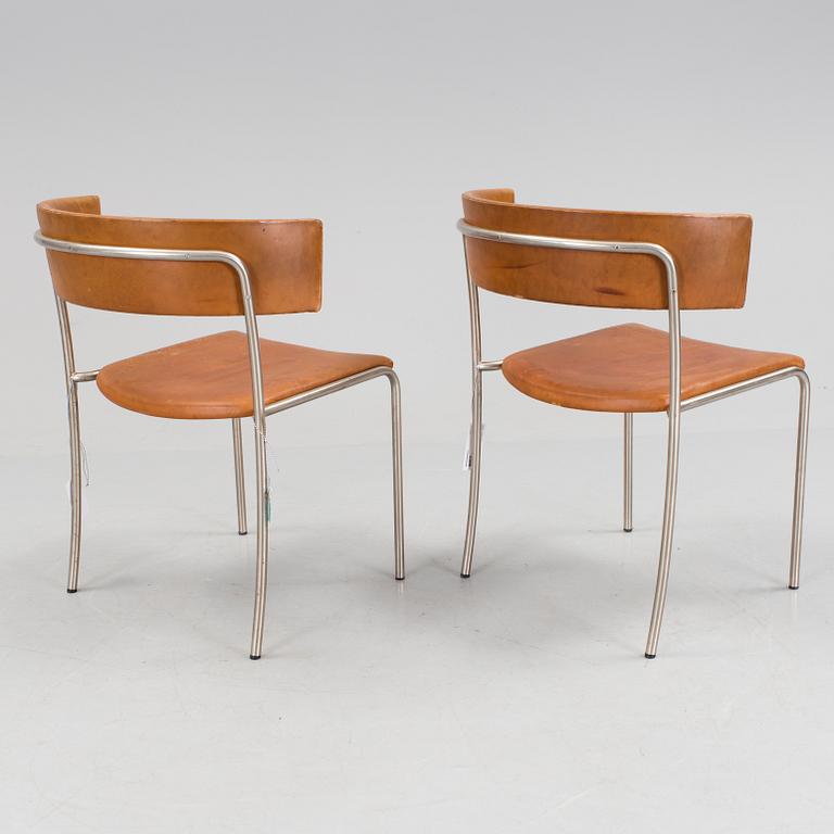 A pair of Erik Karlström leather upholstry chairs, circa 1965.