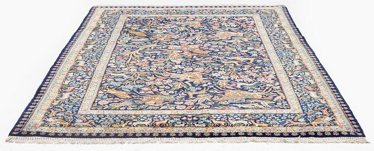 A semi-antique Kirman carpet, south eastern Iran, c. 278 x 188 cm.