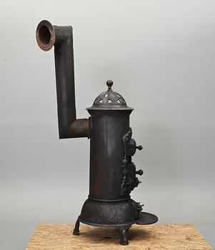 KAMIN, gjutjärn. Ankar Hegaard, Danmark. 1900-tal.