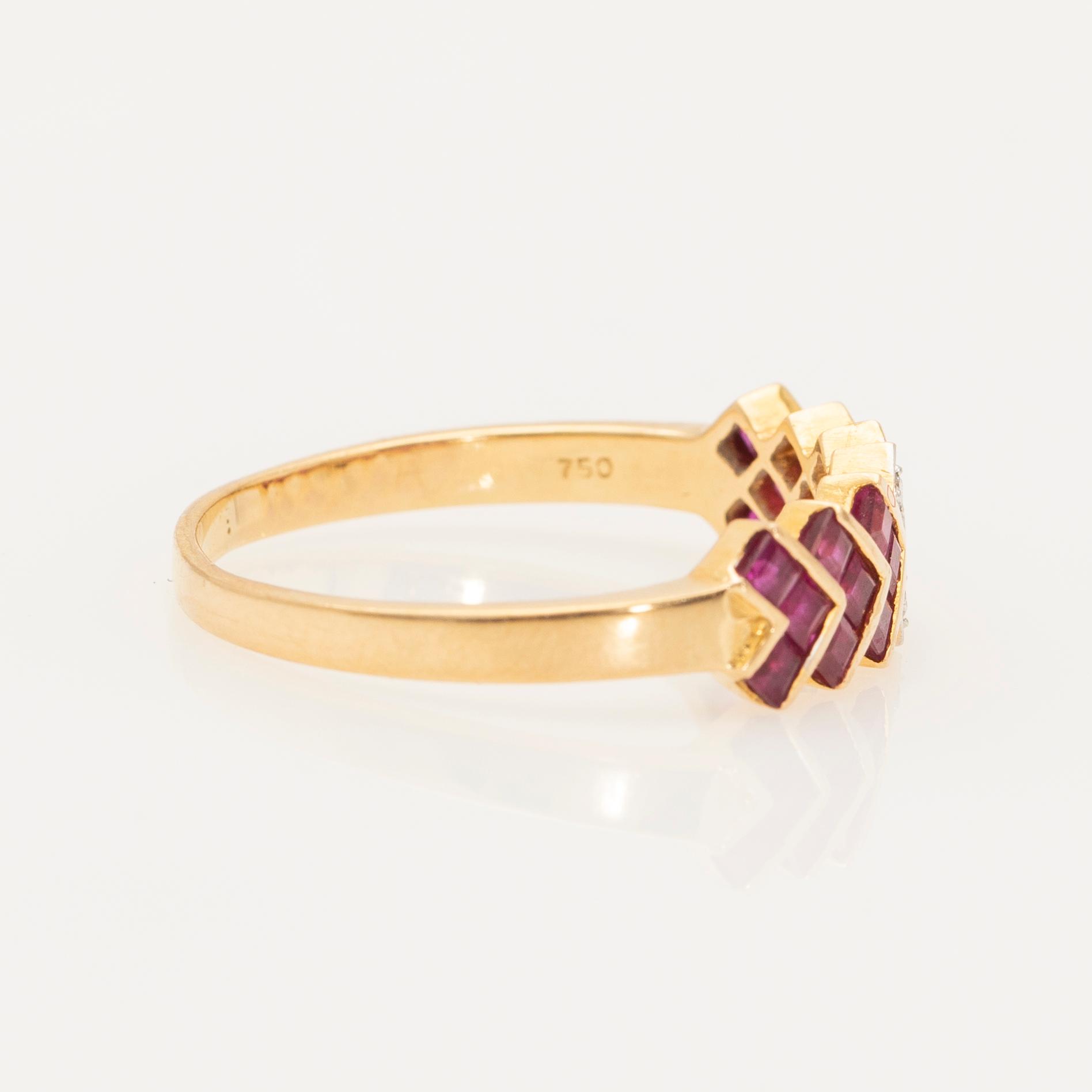 Ring, 18K gold with rubies and diamonds.