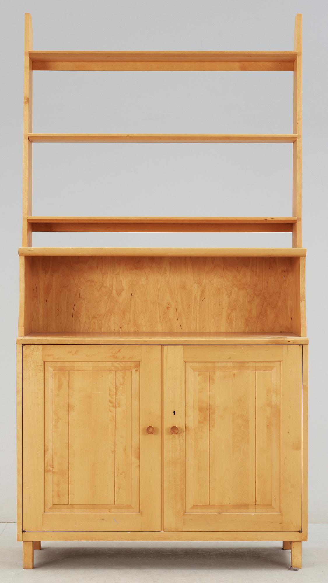 SKÅP MED HYLLA. Carl Malmsten, Åfors Möbelfabrik.