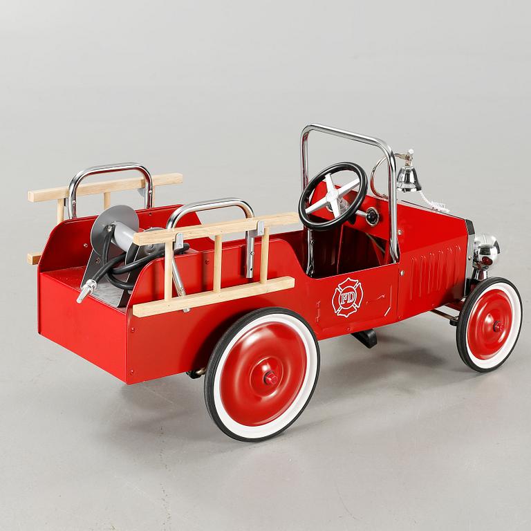 A child´s pedal car from the fourth quarter of the 20th century.