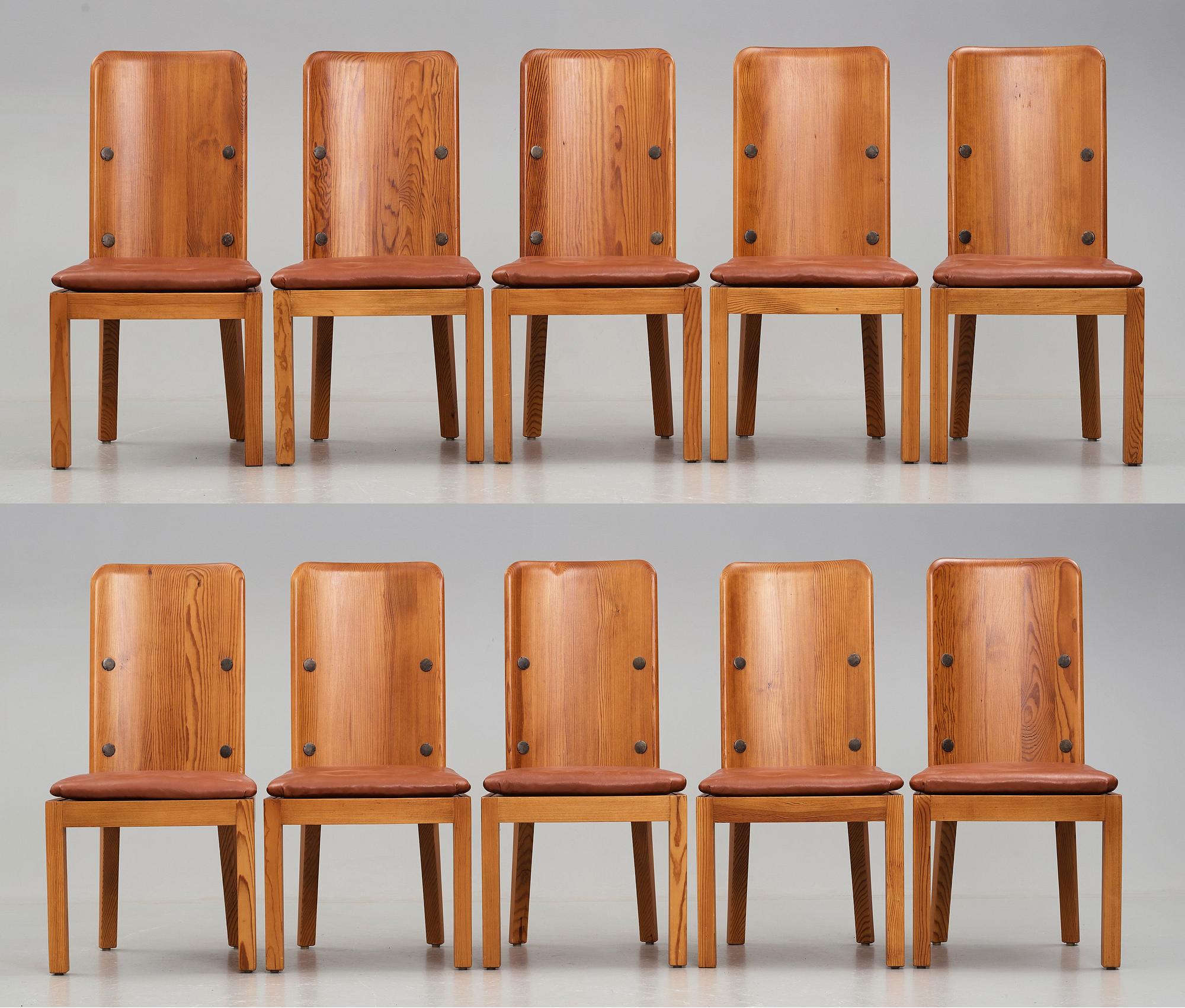 Axel Einar Hjorth, a set of ten "Lovö" stained pine dining chairs, Nordiska Kompaniet, Sweden 1930's.