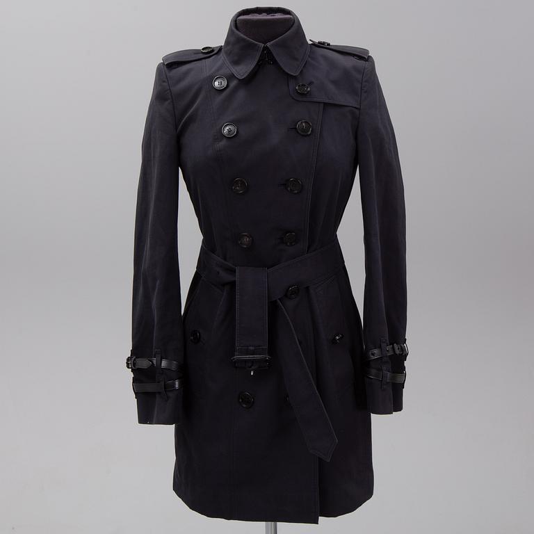 Burberry, a black cotton trenchcoat, UK size 8 (36).