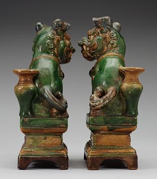 A pair of seated Buddhist lions, 17th Century.