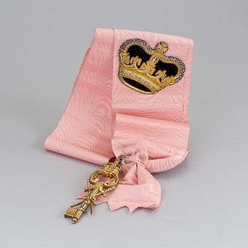 A sash with key 19/20th century.