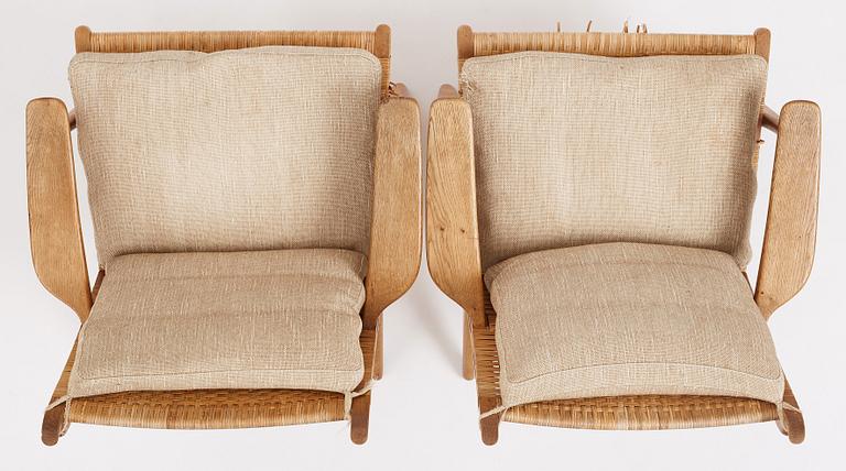 Hans J. Wegner, a pair of oak and rattan 'CH27' chairs, Carl Hansen & Søn, Odense Denmark 1950s-1960s.