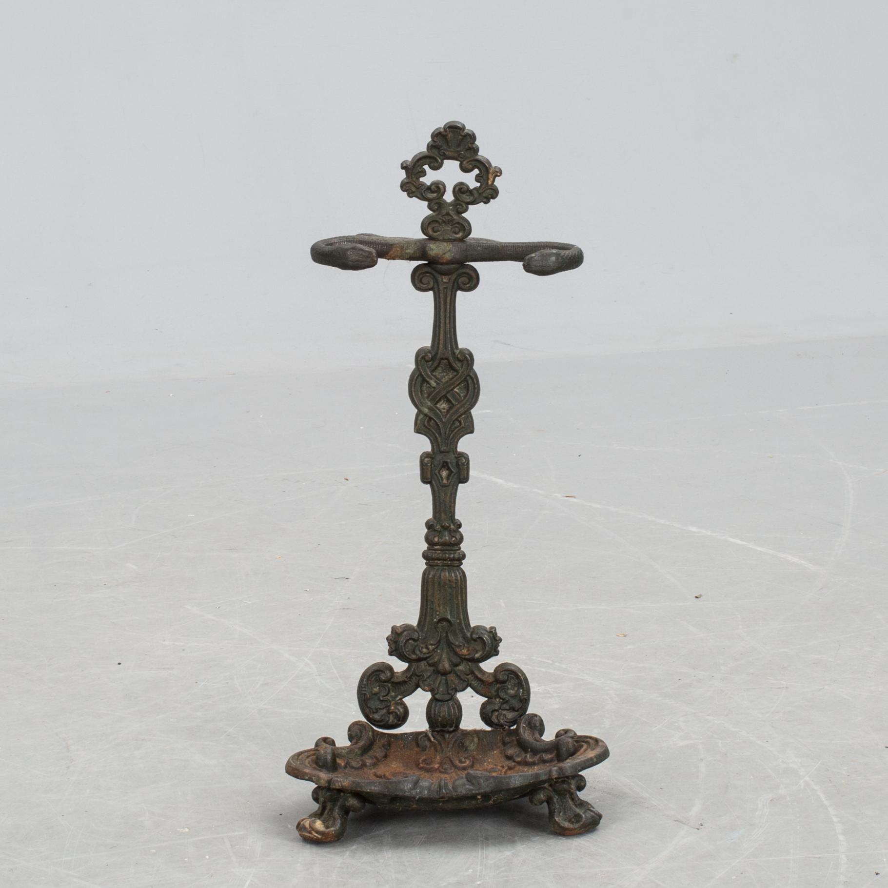 PARAPLYSTÄLL, gjutjärn.