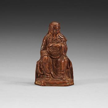 229. A seated copper-alloy figure of a the God of War, Guan Di, Ming dynasty (1368-1644).