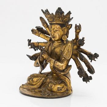 A gilt-bronze figure of a Boddhisattva, Ming dynasty (1638-1644).