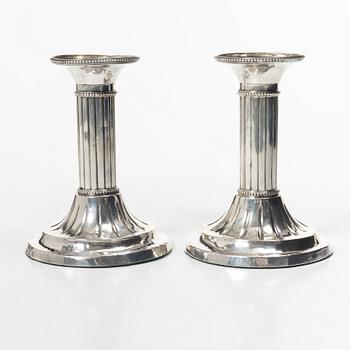 A Swedish pair of 18th century Gustavian silver candlesticks, worn city and maker’s marks, Sweden 1795.