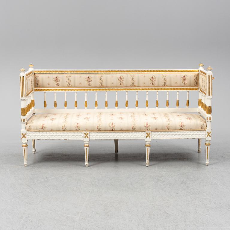 A late gustavian sofa, ca 1800.