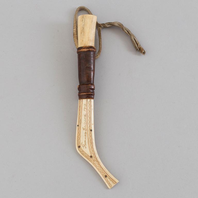 A Sami knife signed Gunnar Ericson and dated 1916.