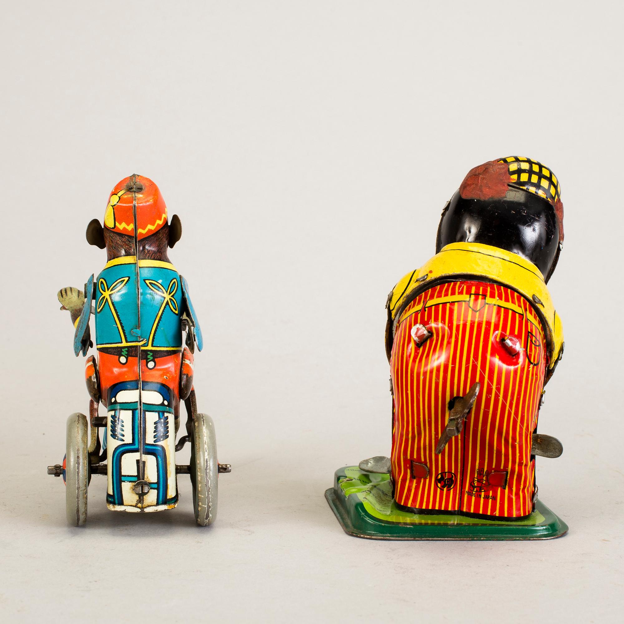 A lot of three tinplate toys Japan and Germany 1950s.