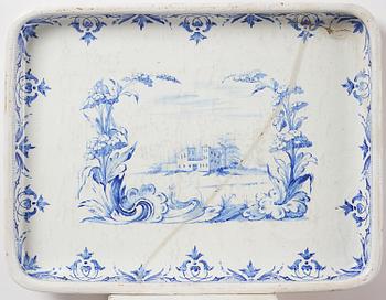 A rococo faience-top tea table, Rörstrand 1760.