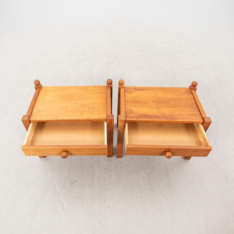 A pair of 1960s walnut bedside tables.
