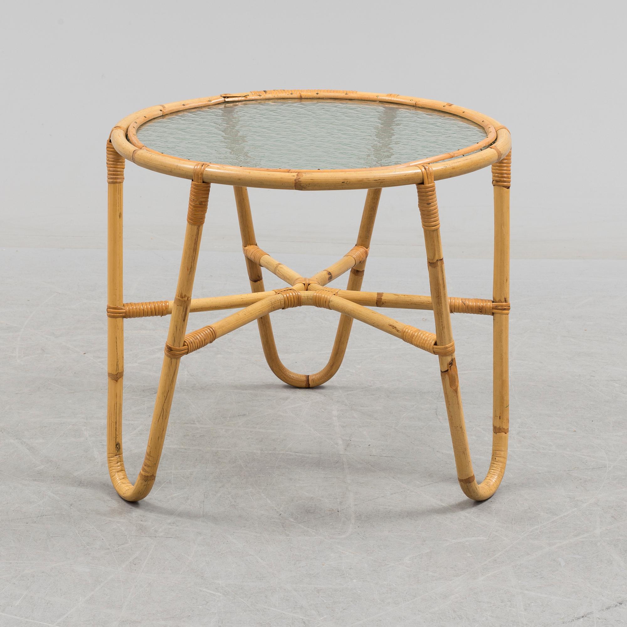 A second half of the 20th century sofa, table and armchairs.