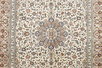 A Kashan carpet, c. 403 x 300 cm.