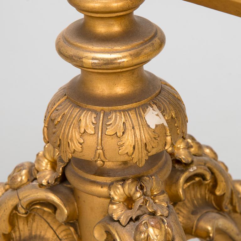 A late 19th century fire screen.