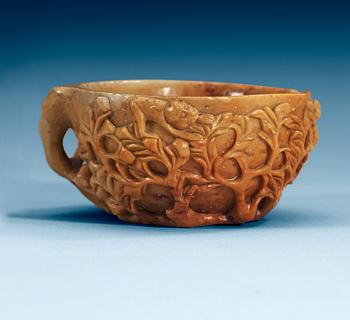 A soapstone sculpture and cup, Qing dynasty.
