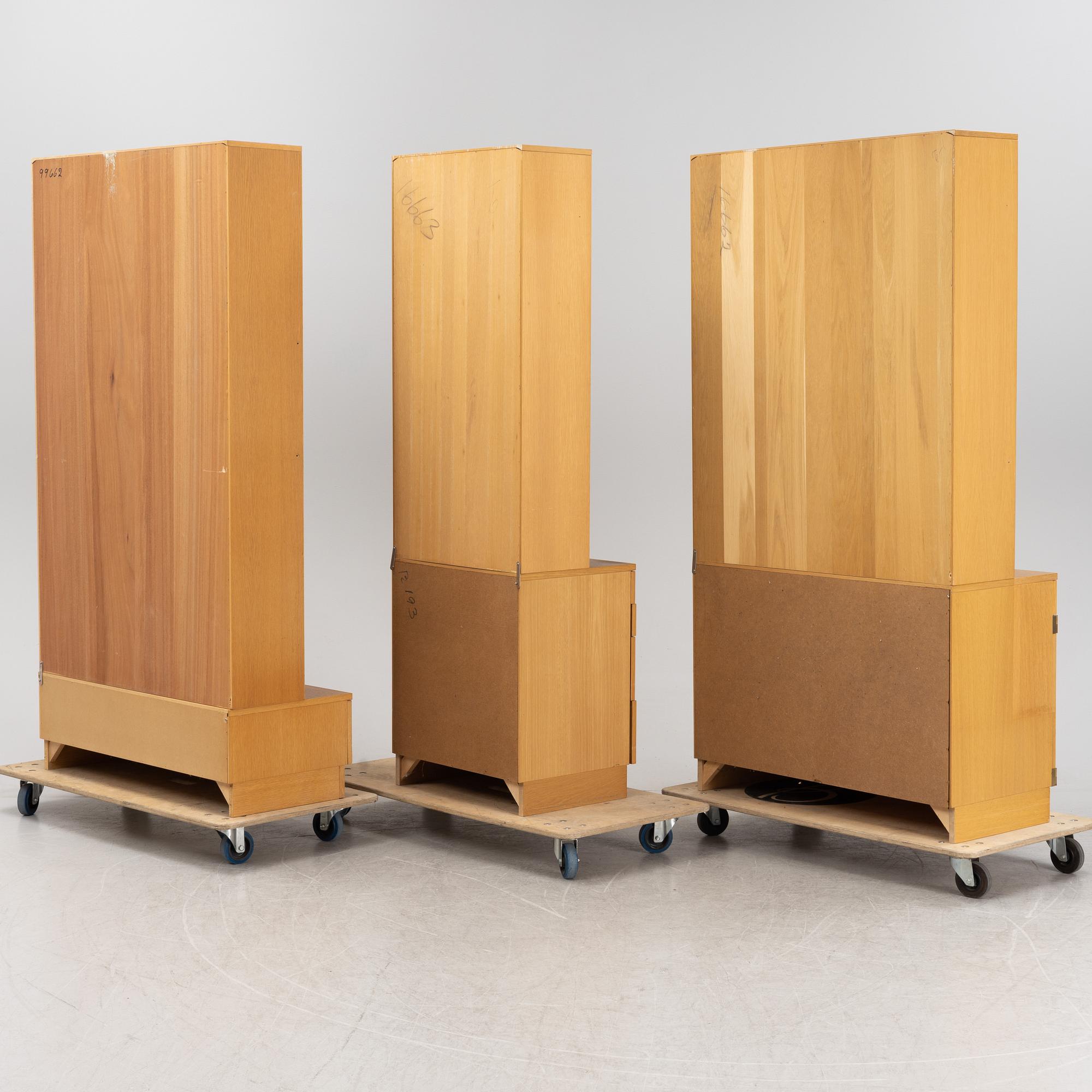 BERTIL FRIDHAGEN,BODAFORS. A set of three oak-veneered bookcases, later part of the 20th Century.