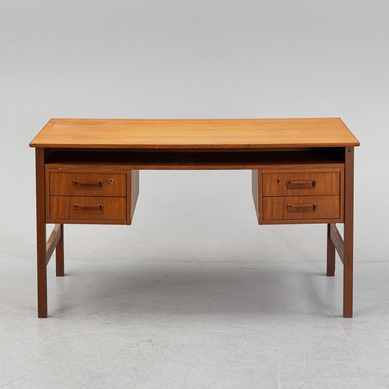 A 1960's teak writing desk.