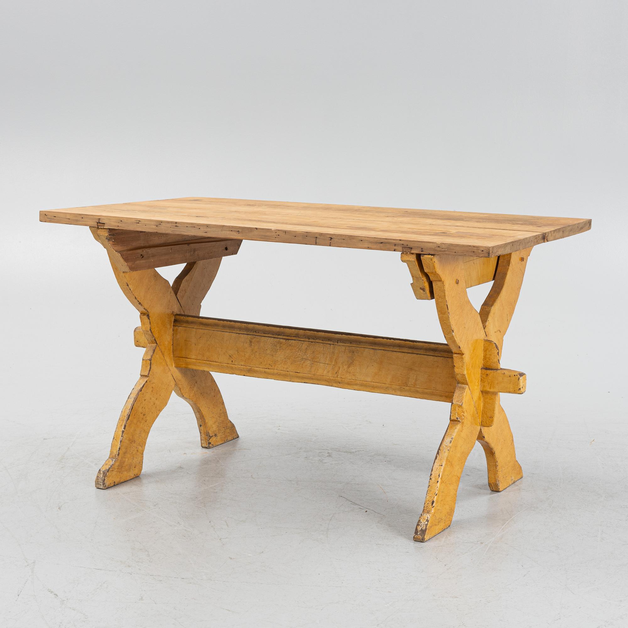 A pianted trestle table, 19th Century.