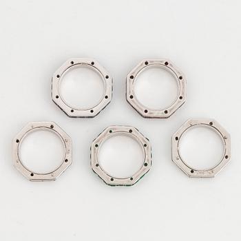 Five Paul Binder rings in 18K white gold set with baguette- and round brilliant-cut diamonds.
