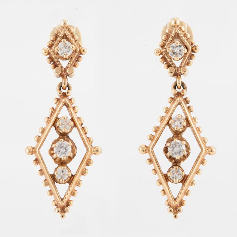 Earrings, a pair, 14K gold with brilliant-cut diamonds.