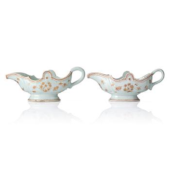 A set of two iron red and gold sauce boats, Qing dynasty, Qianlong (1736-95).