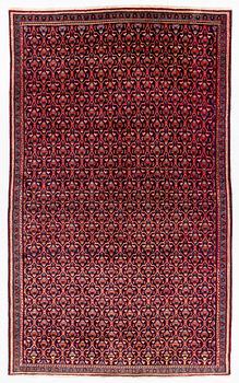 An oriental rug, c. 295 x 180 cm.