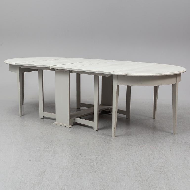 A painter three-part dining table, 19th Centruy.