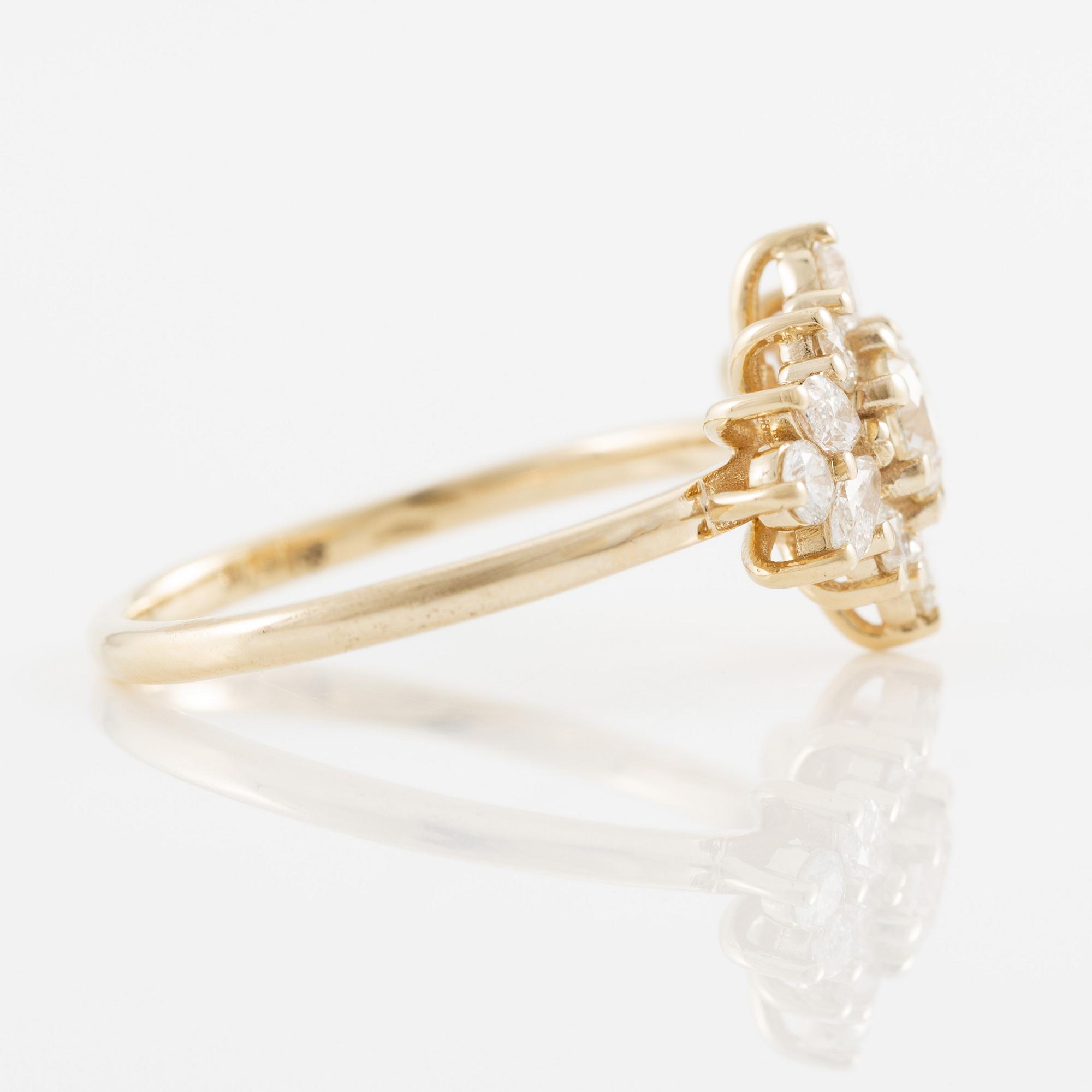 Ring in 14K gold set with brilliant-cut and marquise-cut diamonds.