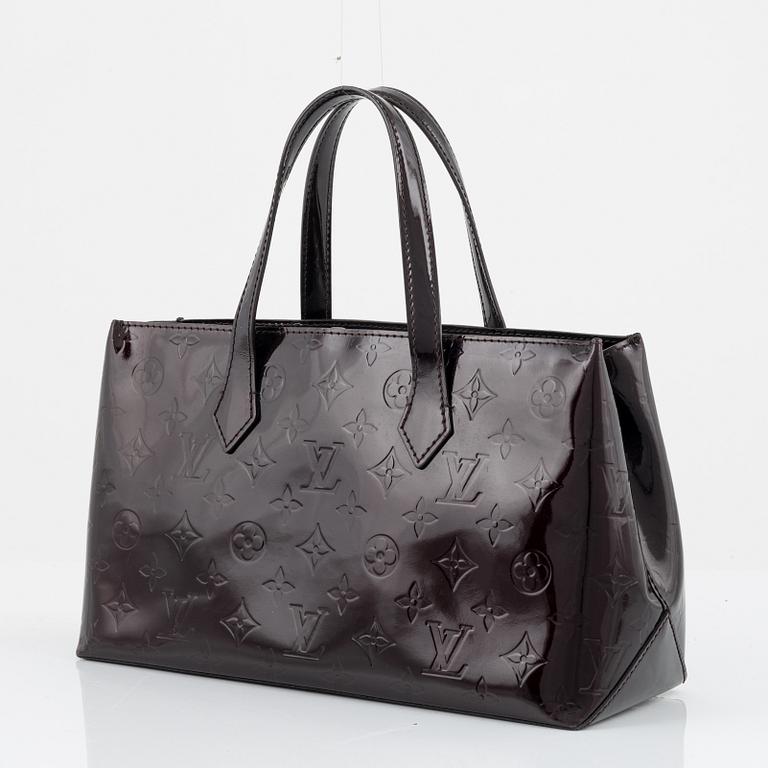 Louis Vuitton, a vernis patent leather 'Wilshire' bag.