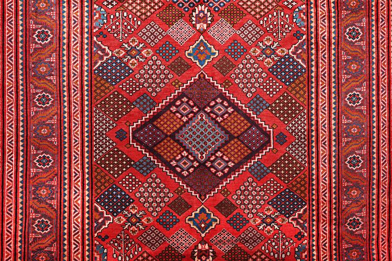 A carpet, Mahabad, c. 308 x 208 cm.