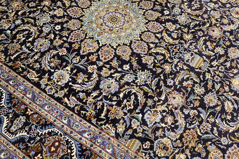 A Kashmar carpet, approx. 335 x 248 cm.