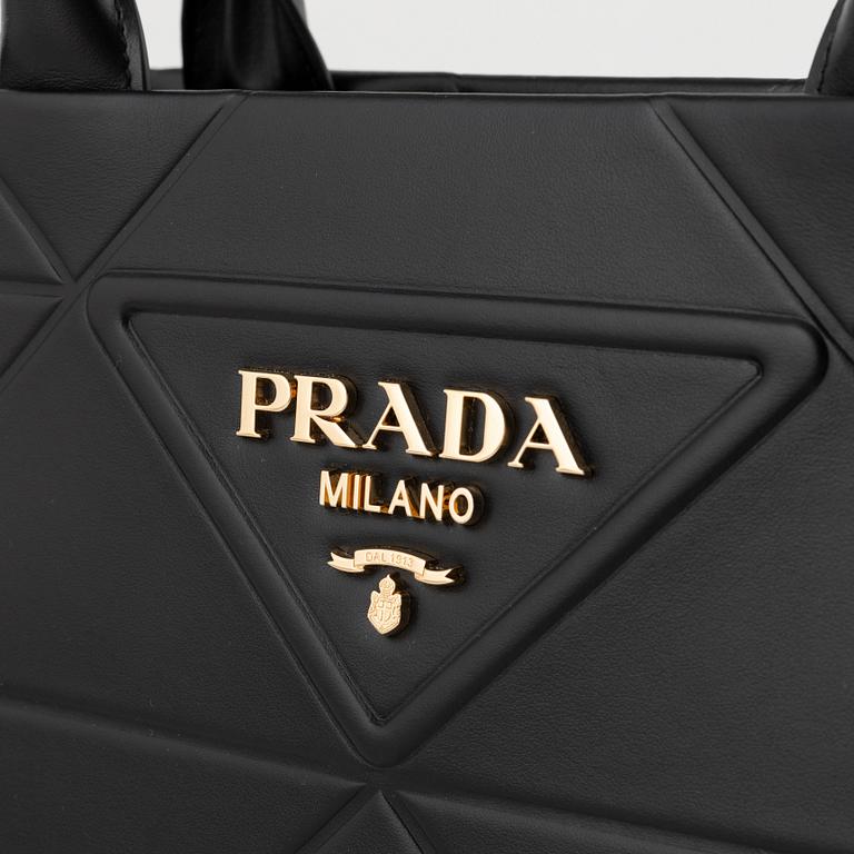 Prada, a black leather bag.