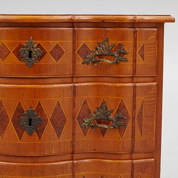 A late Baroque Chest of Drawers, mid 18th Century.