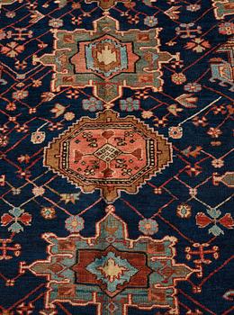 A CARPET, a semi-antique Heriz, 335,5-337,5 x 237-240 cm.