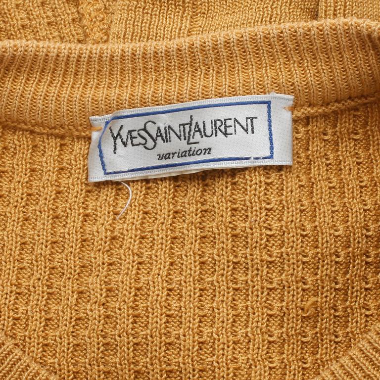 YVES SAINT LAURENT, a yellow mustard sweater, from the 1980s.