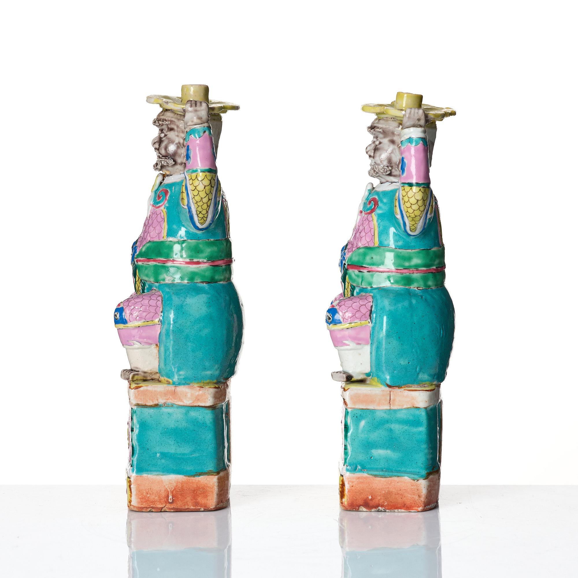 A pair of famille rose candlesticks, Qing dynasty, Qianlong (1736-95).