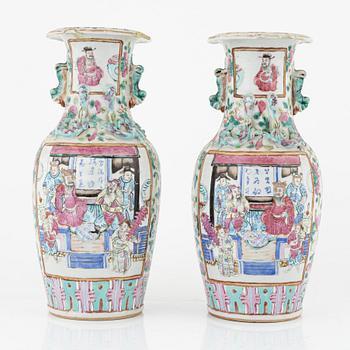 A pair of famille rose Canton vases and  a bowl, Qing dynasty, 19th Century.