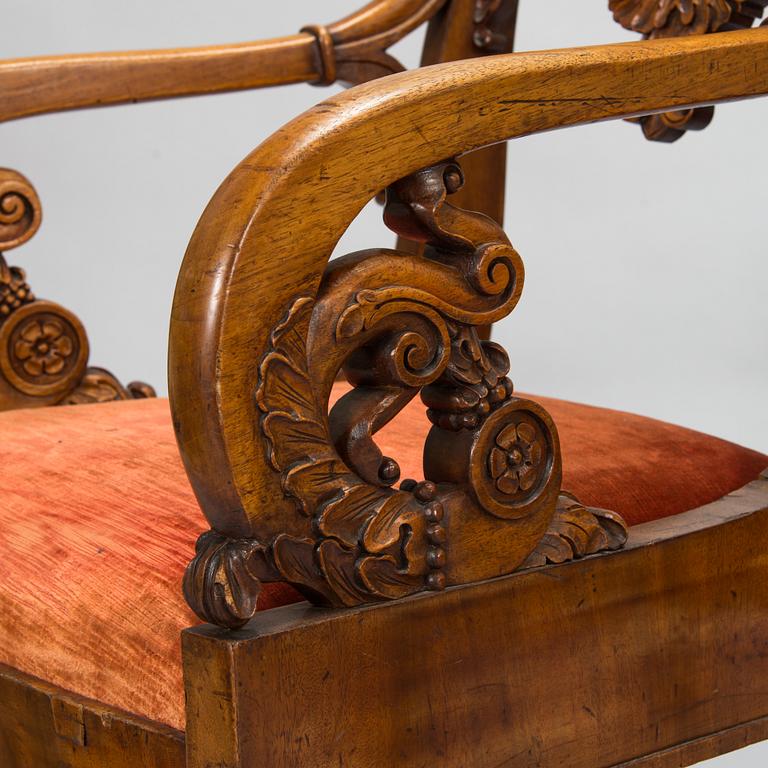 A pair of Baltic open armchairs from around 1820.