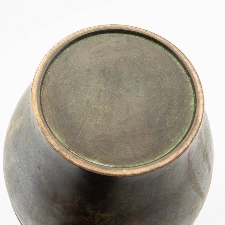 An early 1900s bronze vase.