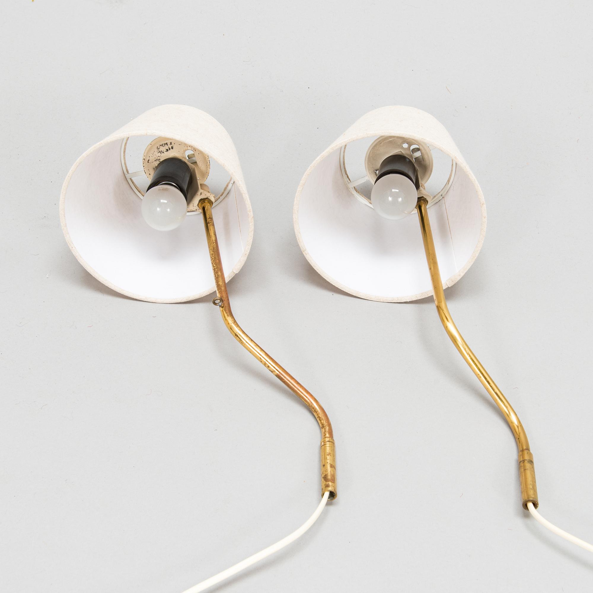 Lisa Johansson-Pape, Two mid-20th century '3053' wall lights for Stockmann Orno.