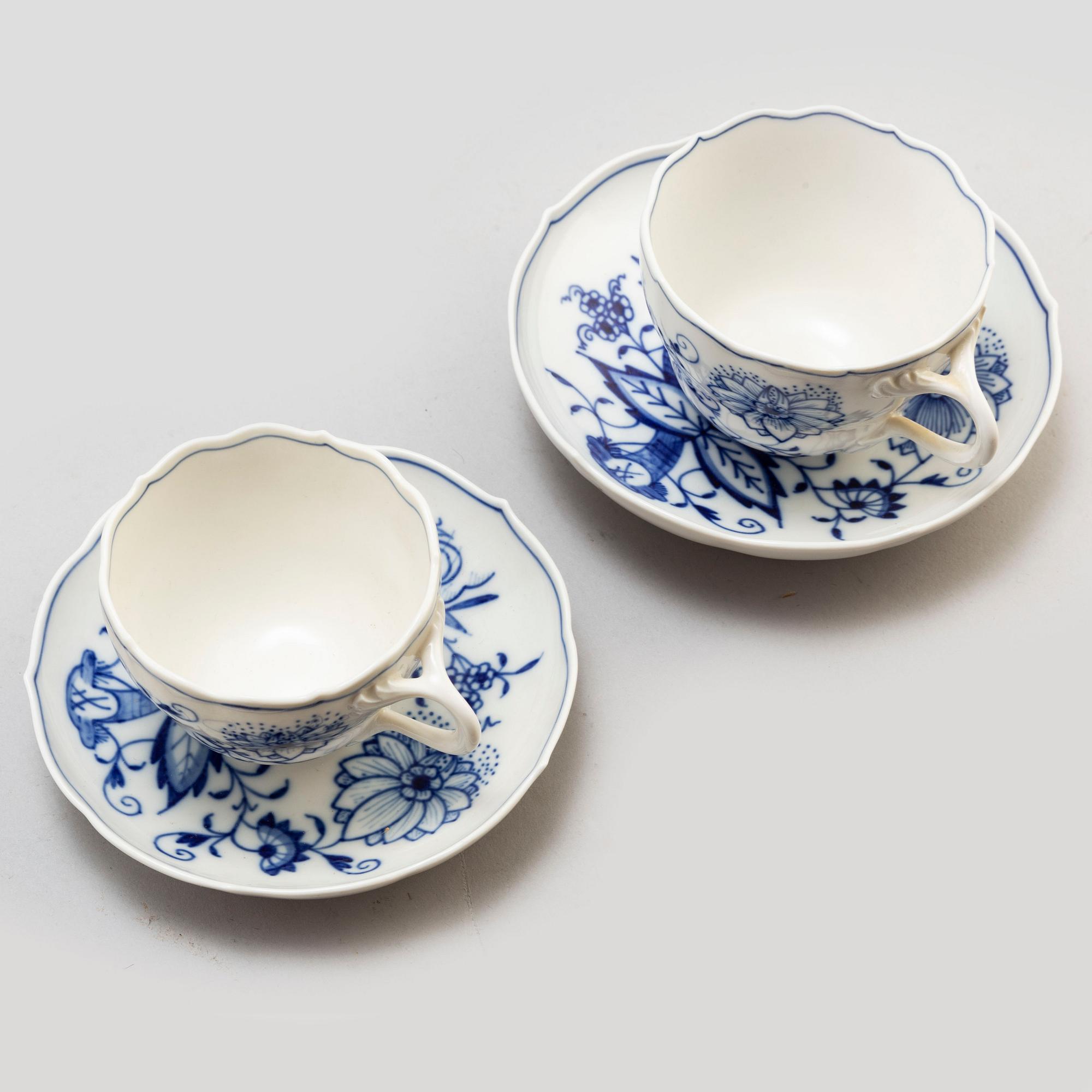 A 50-piece porcelain 'Onion pattern' service from Meissen, Germany.