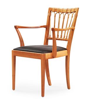 464. A Josef Frank mahogany and rattan armchair, Svenskt Tenn, model 1165.