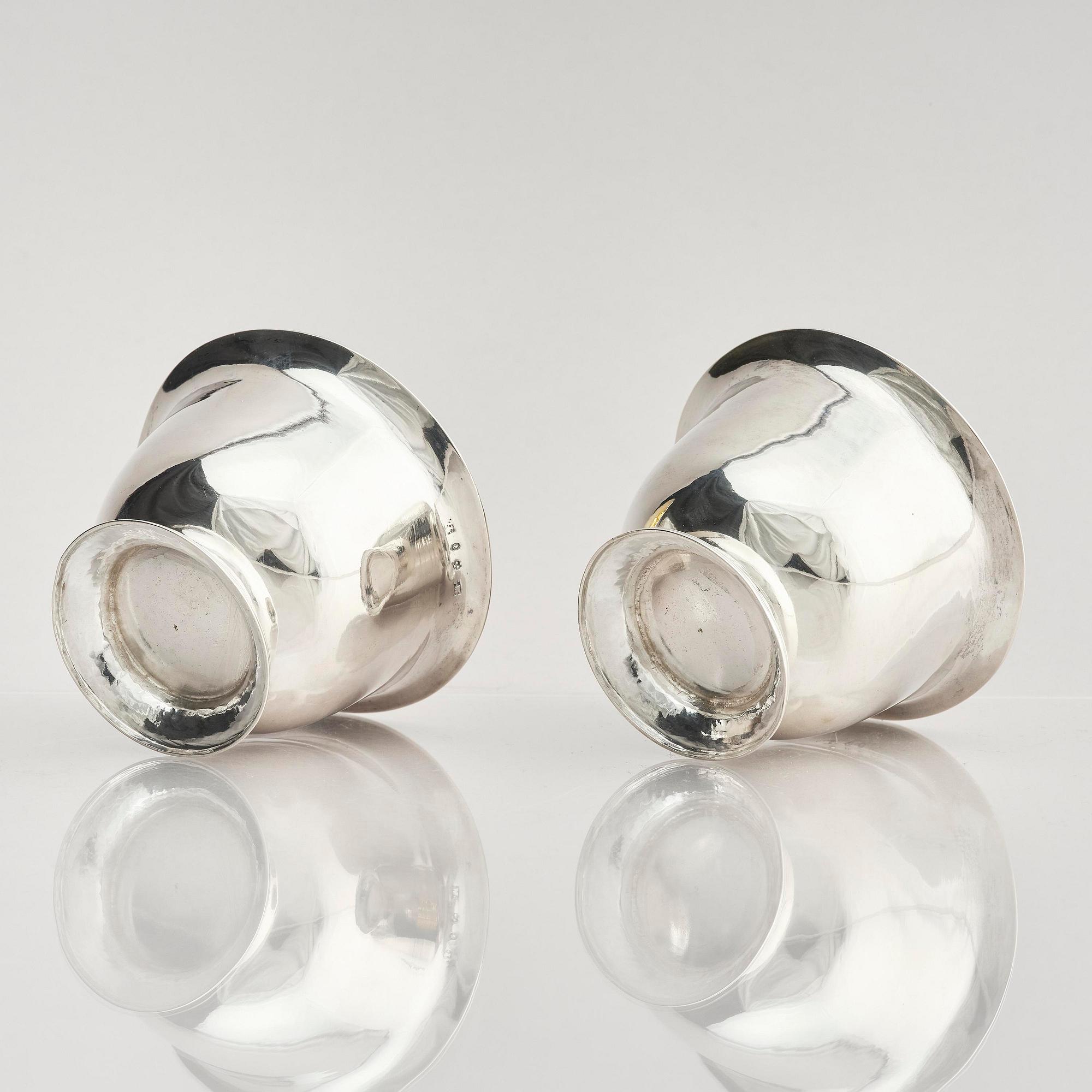 A pair of Swedish parcel-gilt silver dessert bowls with stand, mark of Gustaf Möllenborg, Stockholm 1830.