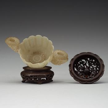 A nephrite cup with wooden cover and stand with silver inlay and quartz finial, Qing dynasty, 19th Century.